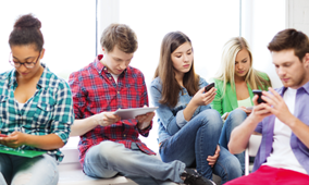 young adults with tablets and smart phones